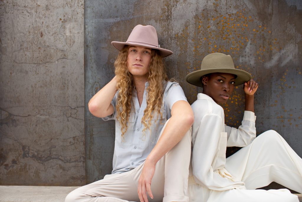 Photo of two models posing with Jamie Slye hats